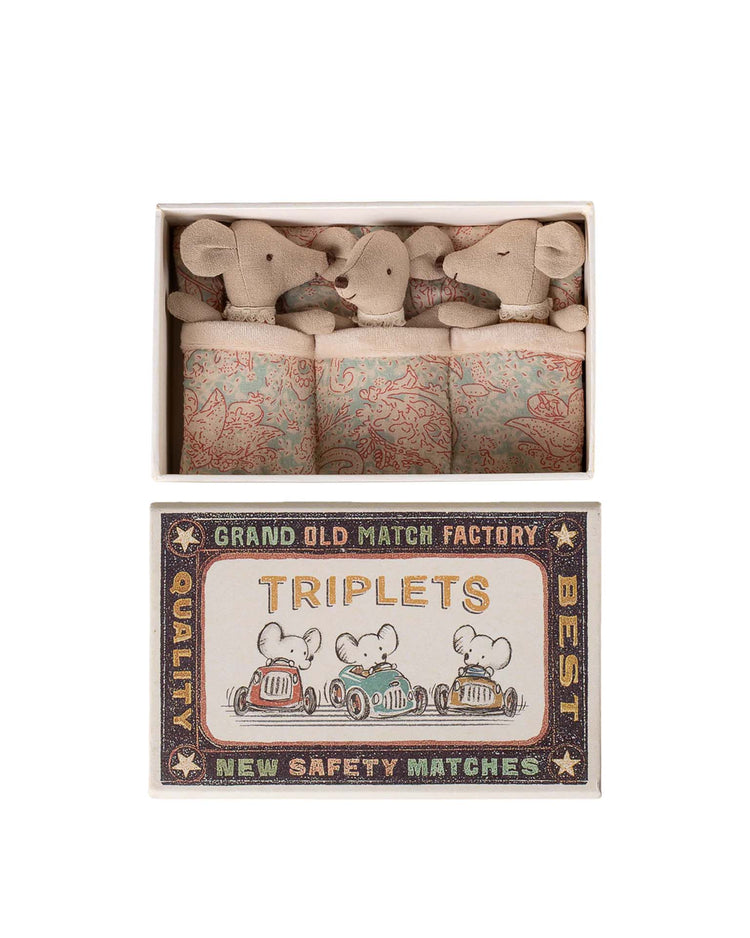 Maileg’s triplets baby mice in matchbox – checker features three small mice wrapped in patterned blankets, lying side by side in a matchbox bed with vintage-style artwork and “Triplets” and “New Safety Matches” on the lid.