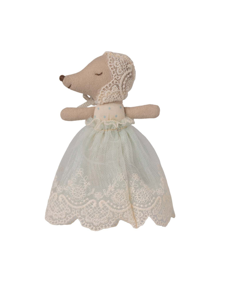 Meet the Maileg baby mouse in gown - mint, featuring a sweet lace bonnet and mint cotton dress—an adorable addition to any baby mouse accessories collection.