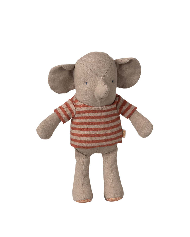 The Maileg little jumbo is an elephant toy with large ears and magnetic hands, wearing a red and beige striped shirt, standing upright and facing forward.