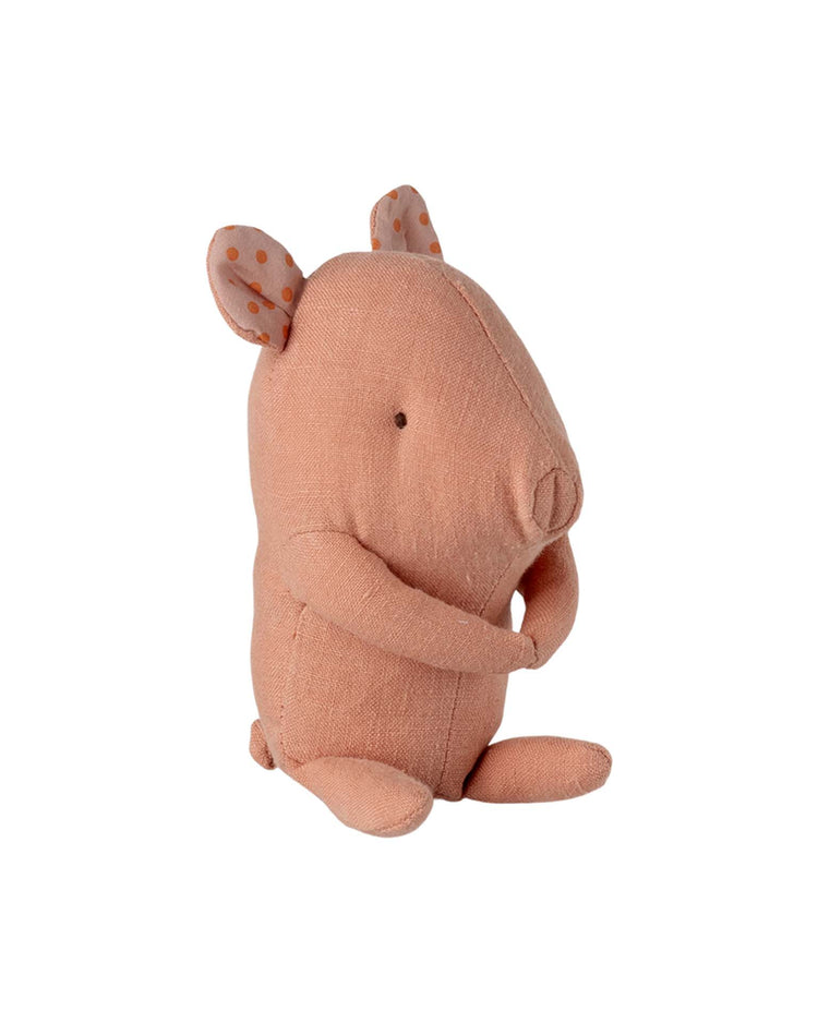 The maileg lullaby friends, pig, mini - rose is a soft toy pig in gentle pink fabric with stitched features and rounded ears—perfect as a newborn gift or cuddle cloth, shown upright against a white background.