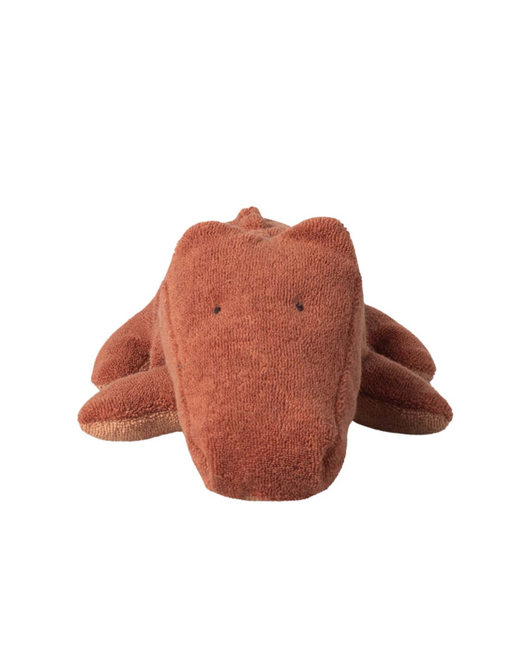 The maileg small crocodile in vintage rose, safari friends, is a huggable plush toy made from recycled polyester, lying flat with its head forward and small black eyes on a plain white background.