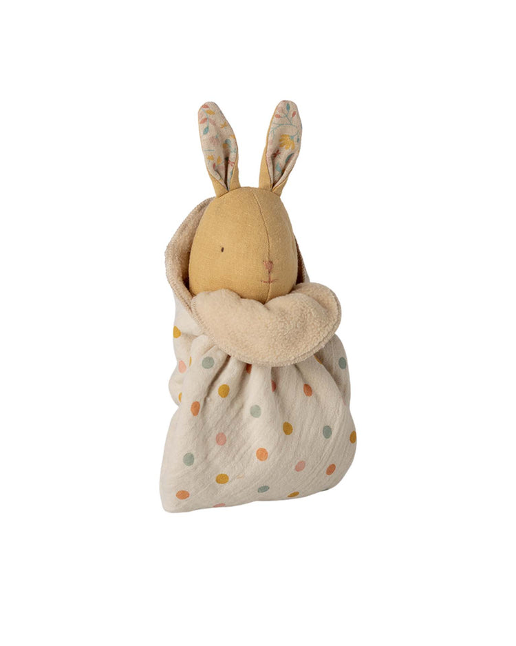 The Maileg lullaby friends bunny, mini - cream yellow, is a plush rabbit soft toy with stitched features and long floral-lined ears, wrapped in a cream-colored cuddle cloth with colorful polka dots—an adorable newborn gift.