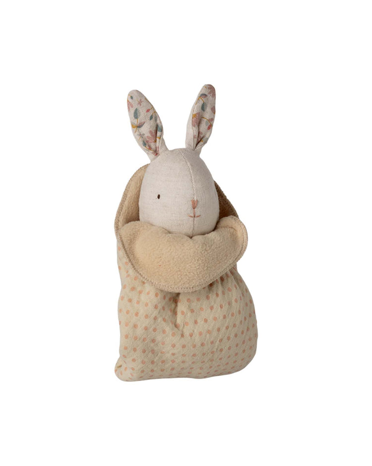 The lullaby friends, bunny, mini - nature by maileg features floral-patterned ears, a stitched face, and a beige polka-dot body wrapped in a cozy blanket—an adorable cuddle cloth and perfect baby gift.