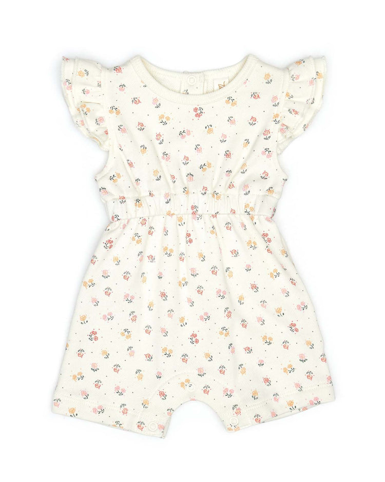 ruffle romper in natural flowers