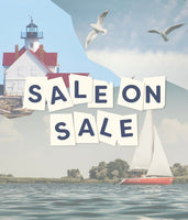 Lighthouse, sailboat, and 