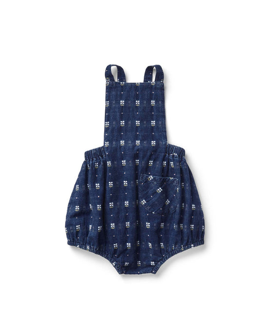 The oona romper by soor ploom is made in Portugal with a blue and white checkered cotton design. It features shoulder straps, elastic leg openings, and a front pocket, all showcased against a white background.