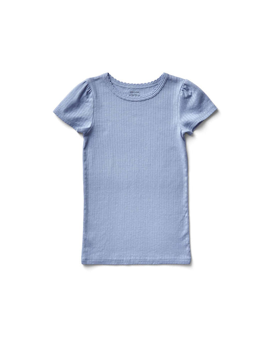 The pouf tee in sky pointelle by soor ploom is a light blue, short-sleeve T-shirt made with soft Peruvian cotton and features a round neckline on a white background.