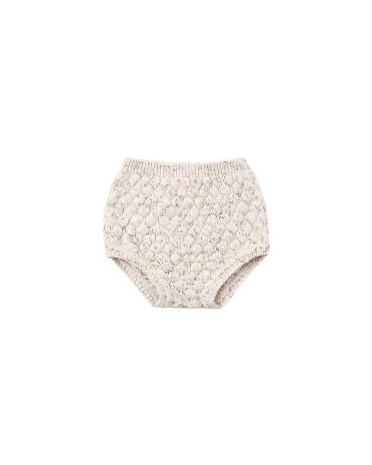 The quincy mae knit bloomer in natural confetti features a cream hue with a textured, diamond-like pattern, high-waisted fit, and elastic waistband and leg openings. Shown on a white background.