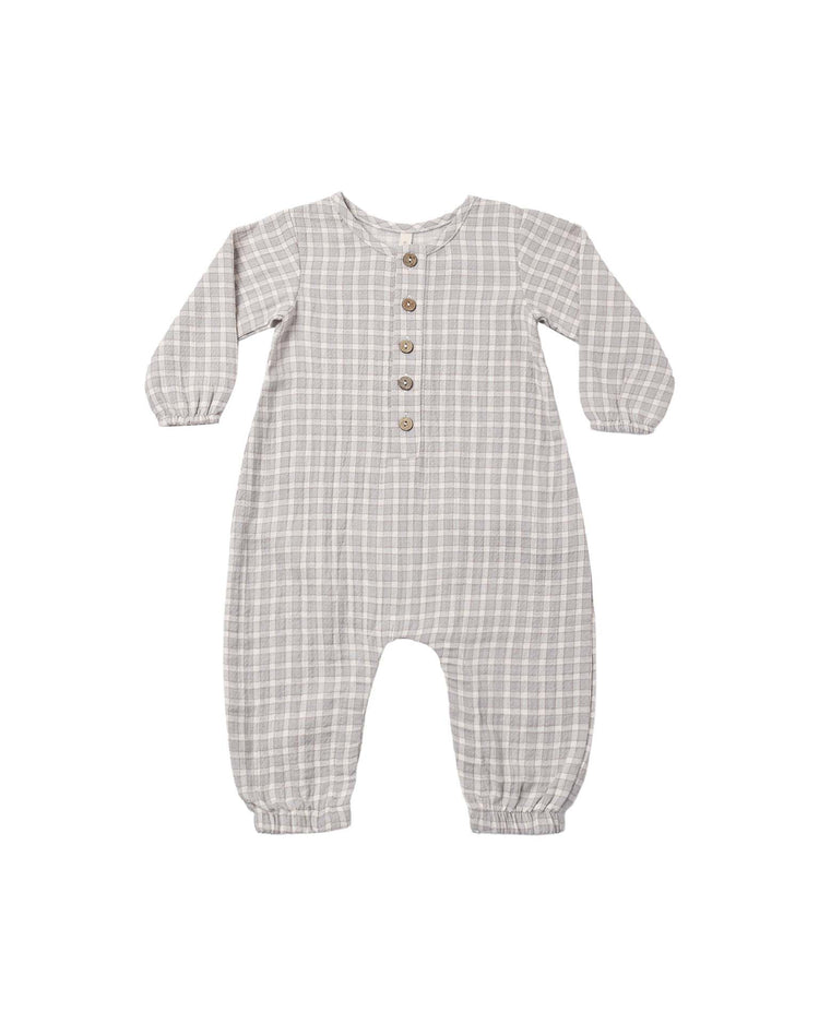 A long-sleeve woven jumpsuit by quincy mae, crafted from soft organic cotton, featuring a blue gingham pattern with charming wooden buttons down the front and elastic cuffs at the wrists and ankles for a cozy fit.