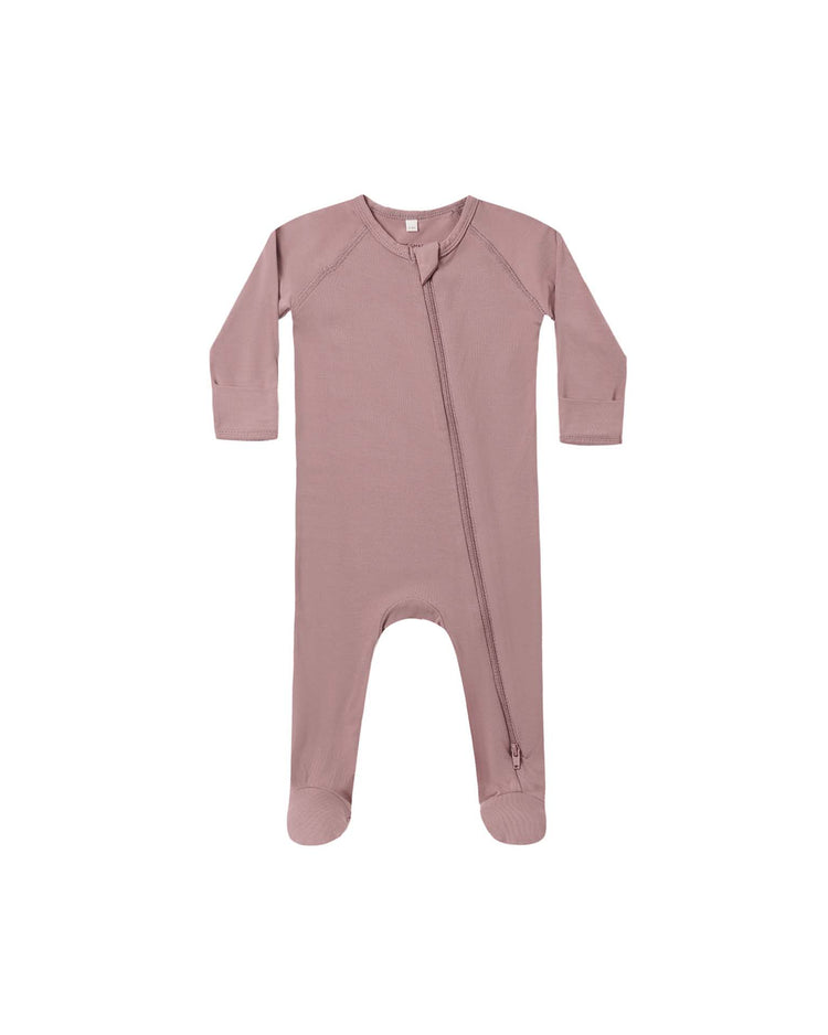 Quincy Mae bamboo zip footie in mulberry, a mauve-colored baby sleepwear with long sleeves and covered feet, features a diagonal zipper from the neck to the left leg and is displayed on a white background.