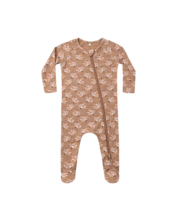 The quincy mae bamboo zip footie in fall floral features long sleeves, footed legs, and a lovely autumn-inspired floral print. Made from cozy bamboo fabric, this onesie has an angled front zipper that extends from the neckline to the left ankle for easy dressing. The design is set against a plain white background.