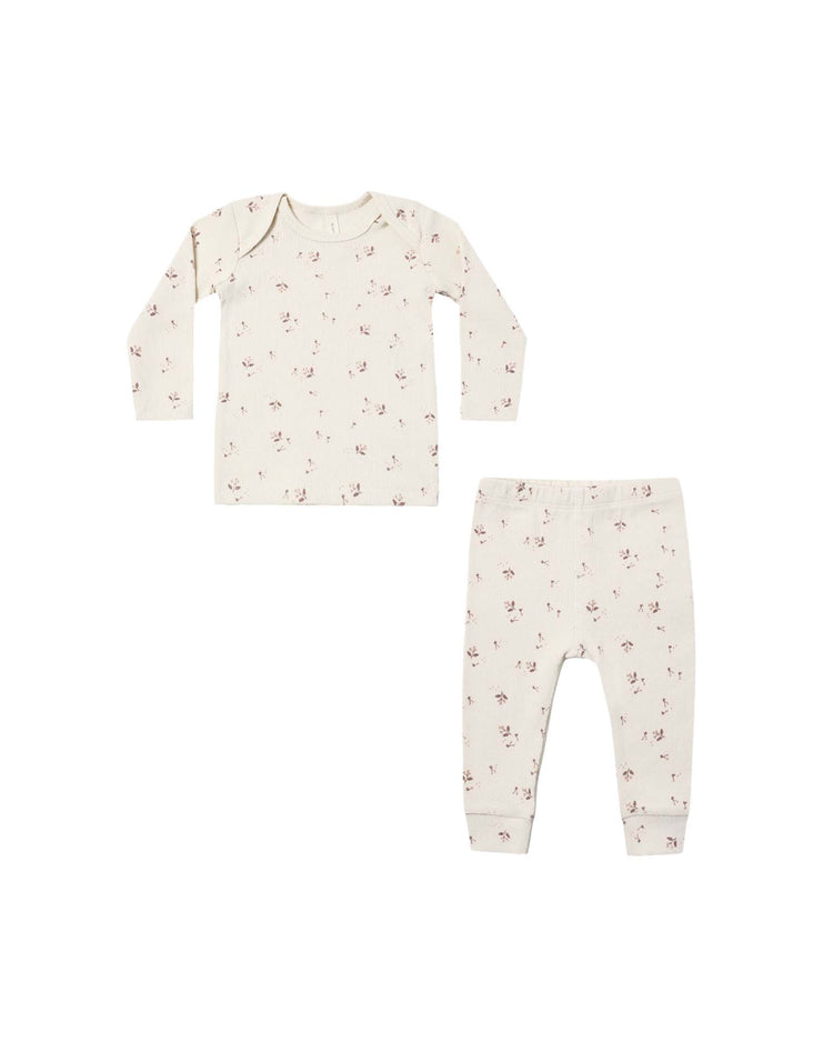 Discover the ribbed tee + legging set in fall ditsy by quincy mae—a cream-colored, slim-fit long sleeve baby outfit featuring a cozy top and leggings, both adorned with a delicate floral print. Crafted from soft organic rib knit, the set is displayed laid flat on a white background.
