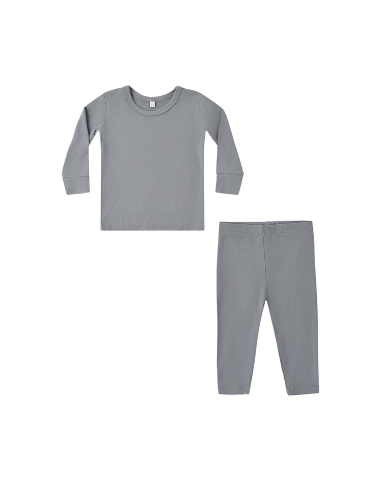 A quincy mae bamboo pajama set in slate, featuring plain long-sleeve gray pajamas with a crew-neck top and matching long pants, is displayed flat on a white background.
