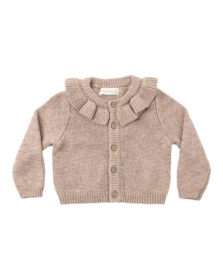 The ruffle collar cardigan in heathered almond by quincy mae is designed for babies with long sleeves, ribbed cuffs and hem, a charming ruffled collar, and wooden buttons down the front. Made from recycled polyester, this knit piece is shown laid flat on a white background.