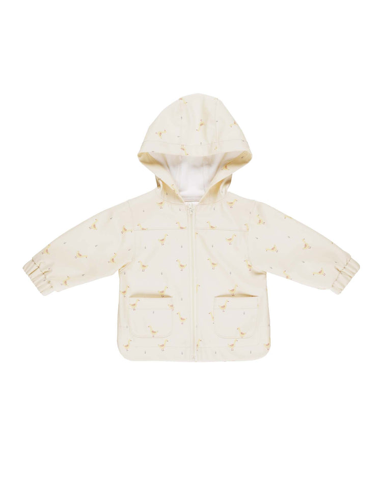 The relaxed sweatshirt by Quincy Mae is a beige baby jacket made from organic cotton featuring a subtle bird print, hood, two front pockets, and a front zipper closure.