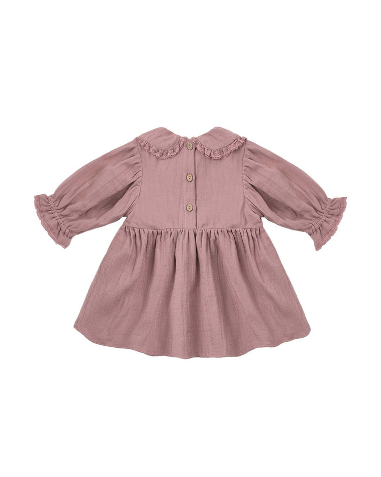 Introducing the marisol dress in mulberry by quincy mae—a long-sleeve baby dress crafted from organic cotton, featuring a ruffled Peter Pan collar and cuffs, button closure down the back, and a gathered skirt.