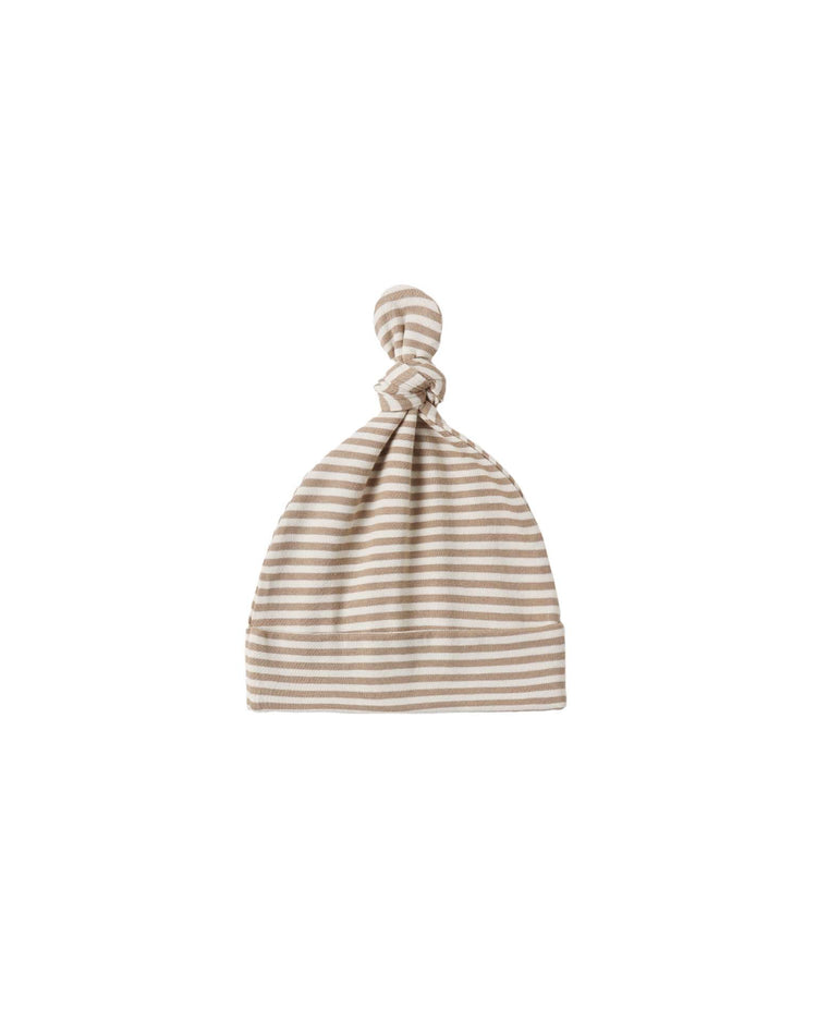 A quincy mae knotted baby hat in almond stripe—featuring beige and white stripes and crafted from soft organic cotton—is displayed on a plain white background.