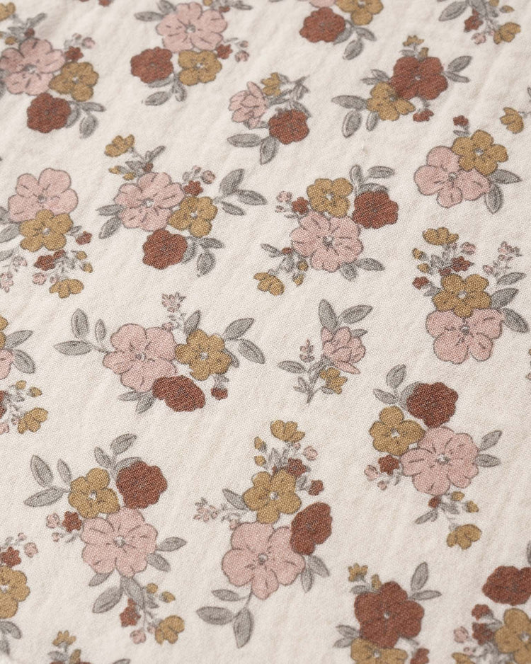 quincy mae woven tie bib in bloom baby Little