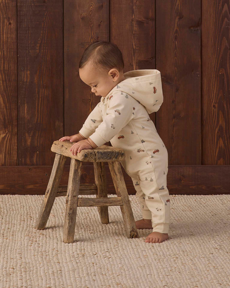 hooded jumpsuit in holiday drive