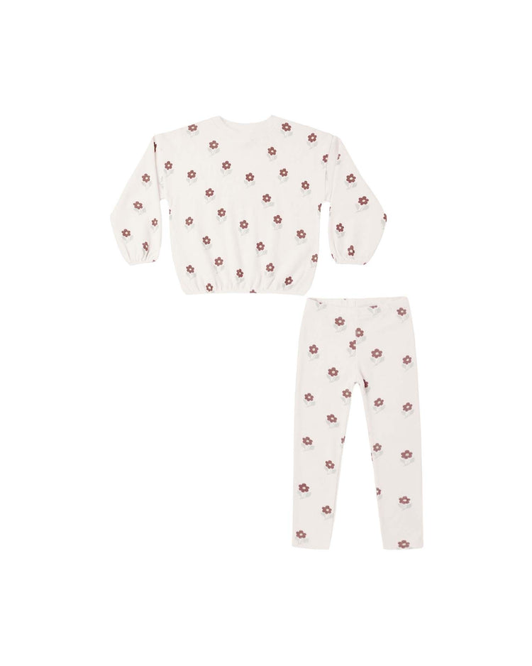 Introducing the PREORDER spongey knit set in petal daisy from rylee + cru: a two-piece pajama set including a pullover sweatshirt with long sleeves and matching pants, both in white adorned with an all-over pattern of pink and brown daisies. The set is displayed flat on a white background, promising cozy comfort in signature rylee + cru style.