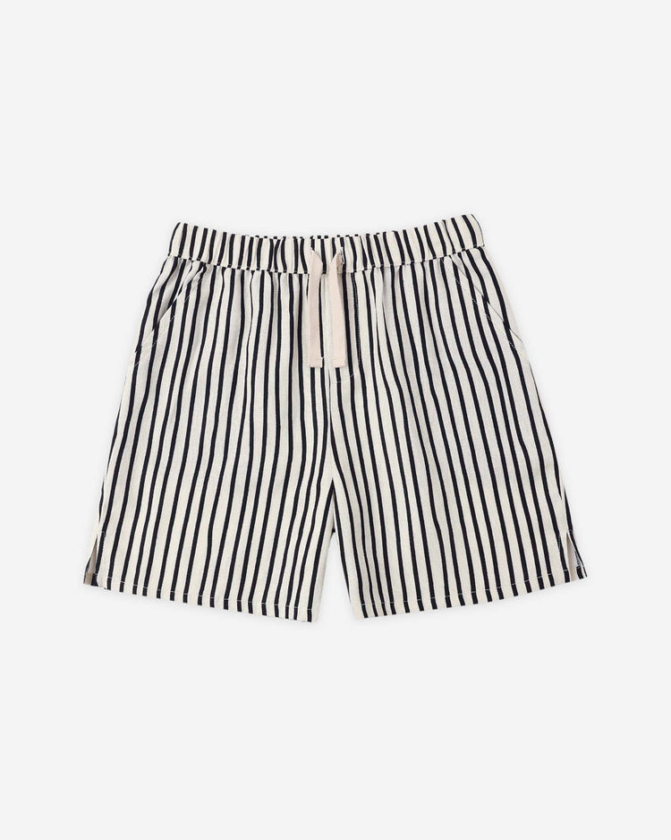 The perry short in wavy stripe by rylee + cru features vertical black and white stripes, an elastic waistband, and a beige drawstring for a distinct vintage vibe in lightweight linen.