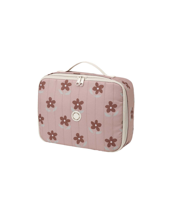 Introducing the "lunch bag in little daisy" by rylee + cru—a rectangular pink travel bag adorned with brown daisy prints, featuring a beige zipper and a convenient beige handle on top. Accented with a round logo on the front, this durable insulated lunch bag keeps your meals fresh while adding style to your on-the-go routine.