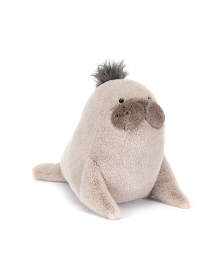 The Jellycat Roarwell Sea Lion plush features light beige fur, a round body, brown whiskers, a gray tuft of hair, and small flippers—a delightful stuffed animal for all ages.