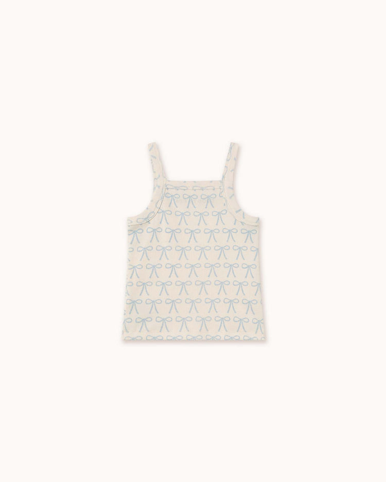 Bows strap top in off-white by tiny cottons, made from organic cotton, featuring a unique blue bow pattern and thin shoulder straps.