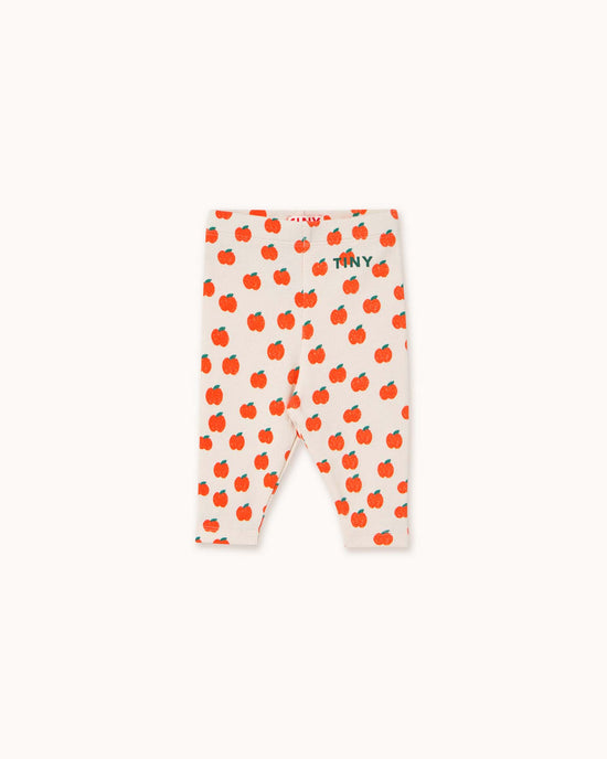 Check out tiny cottons' apples baby rib pant in off-white, featuring playful red apple prints with "TINY" near the waistband for a stylish and comfortable look.