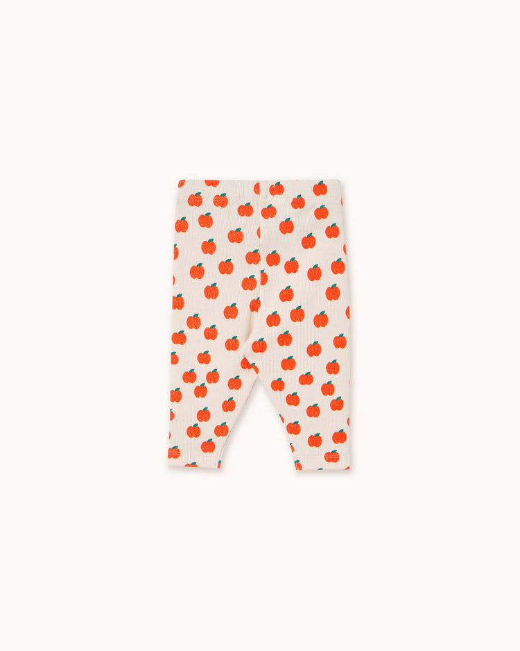 Explore the Tiny Cottons apples baby rib pant in off-white, showcasing a distinctive red apple design. Made from top-quality materials, these pants provide both comfort and style for your little ones.