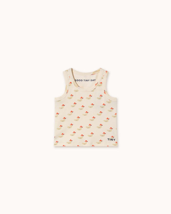 The off-white toddler tank top by tiny cottons features a charming small red fish pattern, "GOOD TINY DAY" inside the neckline, and "TINY" near the hem. Made from organic cotton, it's high-quality clothing for your little one.