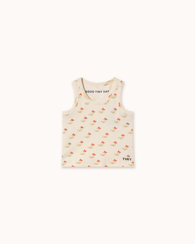The off-white toddler tank top by tiny cottons features a charming small red fish pattern, "GOOD TINY DAY" inside the neckline, and "TINY" near the hem. Made from organic cotton, it's high-quality clothing for your little one.
