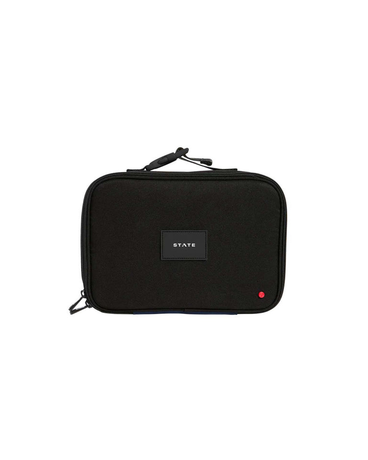 A black, rectangular zippered carrying case with a handle, the Rodgers Lunch Box in Black by STATE Bags features a centered STATE label and a small red dot in the lower-right corner. The insulated lunch box is shown against a white background.