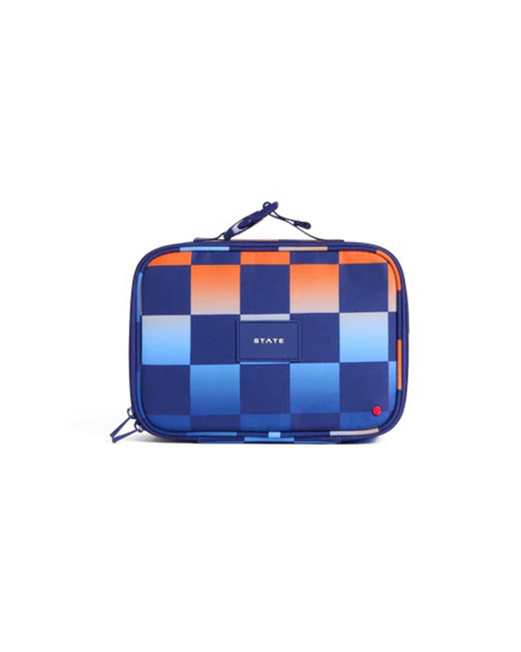 Introducing the rodgers lunch box in gradient checkerboard by STATE Bags—a rectangular insulated lunch box with a blue and orange checkerboard design, convenient top handle, and secure zipper closure. A label featuring the brand name STATE is centered on the front, making it an ideal choice for everyday school lunches.