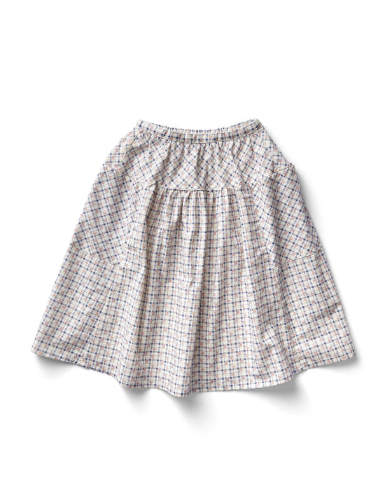 A vada skirt in checker rose print, blueberry by soor ploom, showcases its elastic waistband and gathered pleats as it lays flat on a white background.
