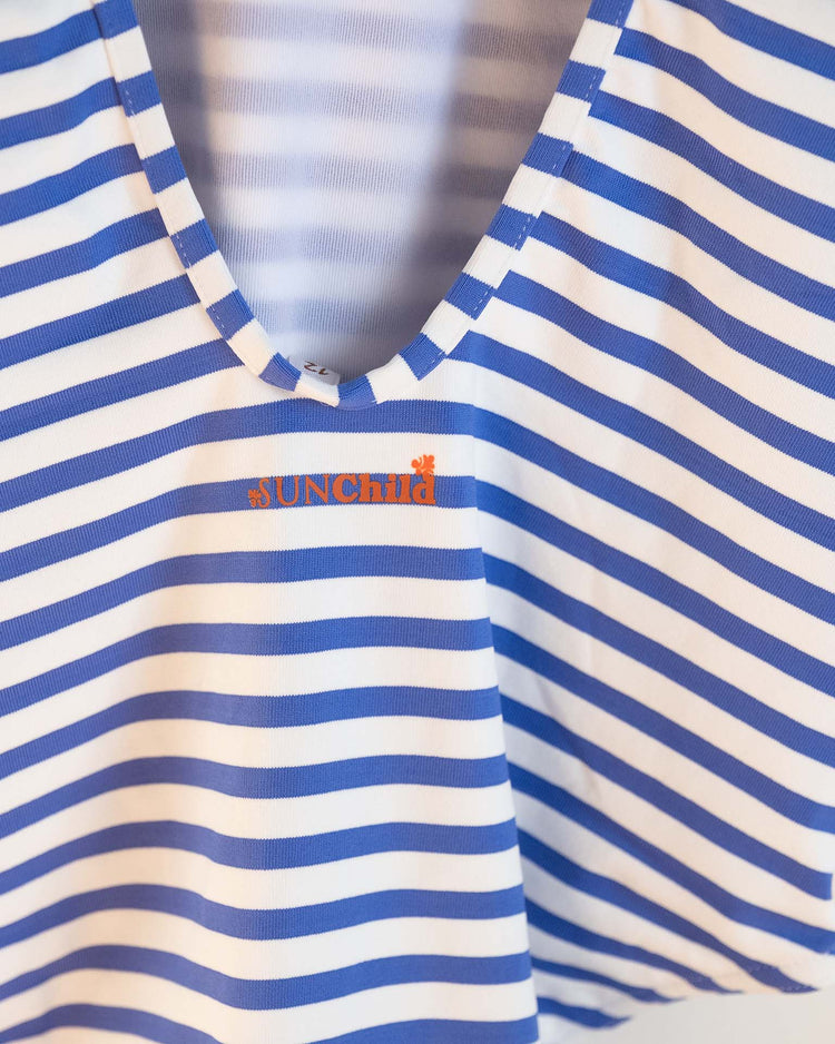 The lou one-piece swimsuit in mare by sunchild features blue and white horizontal stripes with partially visible orange SUNCHILD text on the chest—perfect for pairing with kids swimwear.