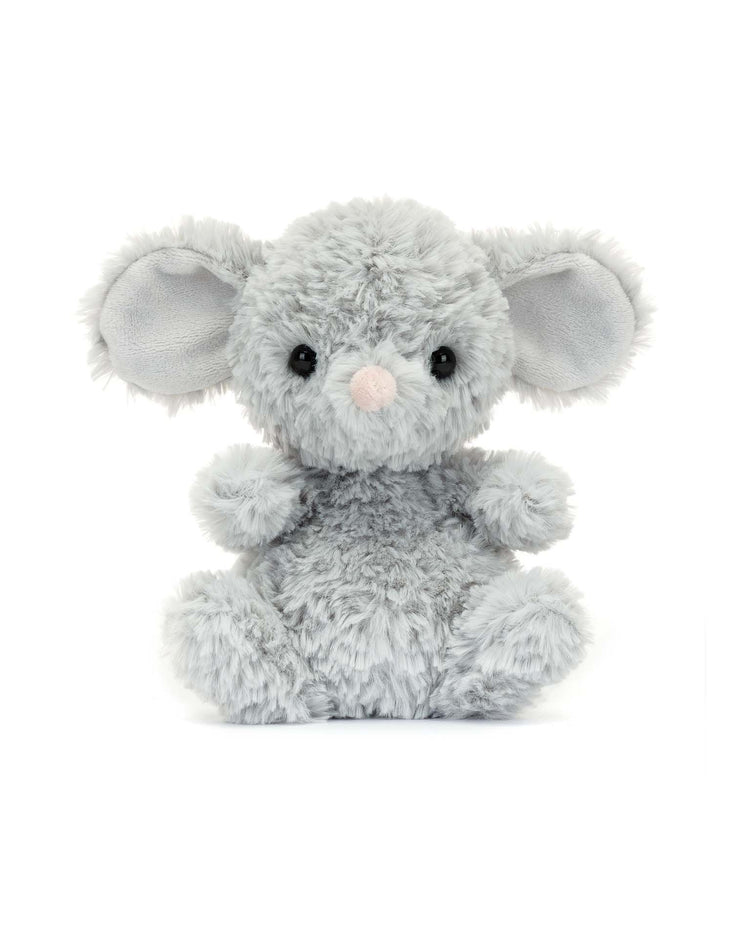 The Jellycat Yummy Mouse is a cuddly toy with light gray fur, large ears, and a pink nose that sits upright on a white background. Its the perfect gift for kids, inviting endless hugs and snuggles.