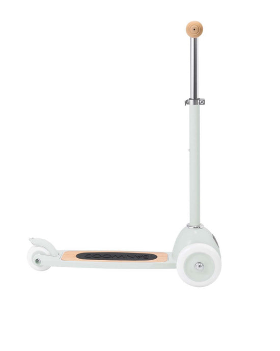 The banwood scooter in mint by banwood is shown against a white background. It features three wheels (two front), a wooden footboard, and a metal handlebar with beige grips, plus an Easy Ride Steering System.