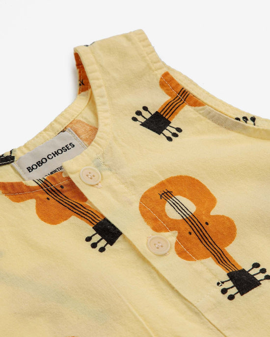 Little bobo choses baby acoustic guitar all over woven baby playsuit