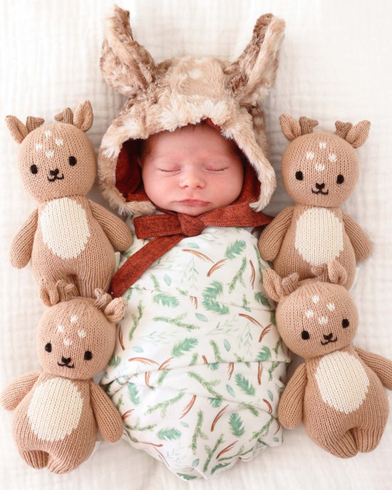 Little cuddle + kind play baby fawn