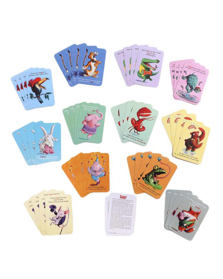 Several vibrant snap playing card decks from eeboo are spread out, each showcasing unique animal illustrations and a set of instructions for the classic game of Snap. Perfect for ages 5 and up, these cards also feature a snappy rhyme on every card.