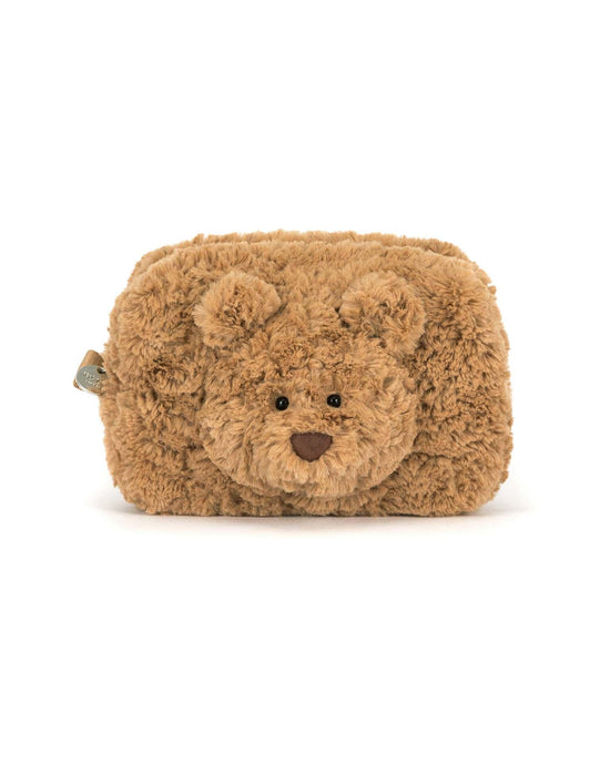 The Jellycat Bartholomew Bear Pouch is a rectangular, fluffy brown pouch with Bartholomew Bear’s face and ears on the front, shown against a white background.