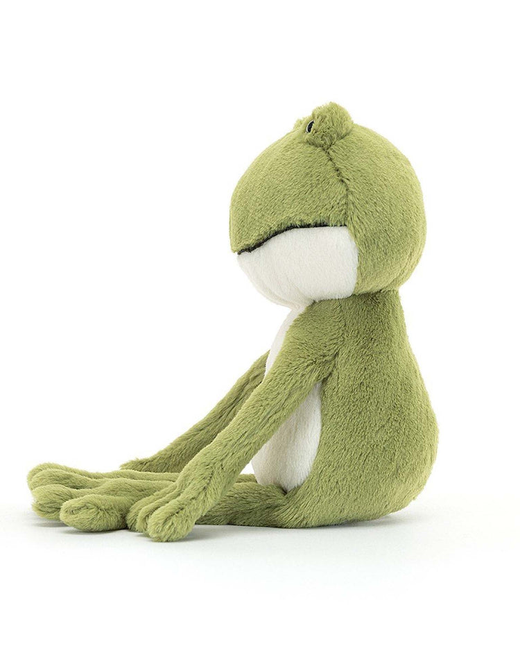 A plush stuffed animal named Finnegan Frog from Jellycat sits upright with its legs extended forward on a plain white background. The frog, featuring mossy green fur and a white belly, boasts a simple, minimalist design.