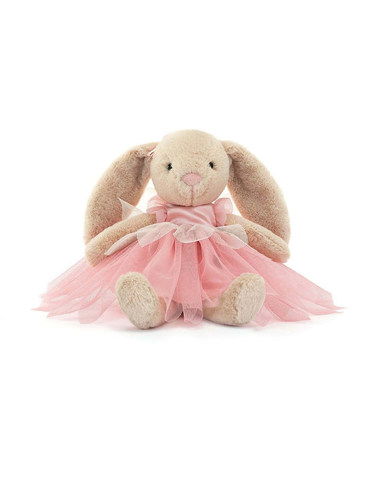 A soft, plush Jellycat Lottie Bunny Fairy wearing a pink tulle dress with a bow, sitting upright against a white background.