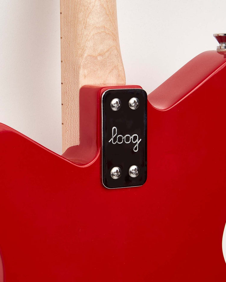 Close-up view of a red Loog Pro Electric guitar, perfect for beginners, with the Loog Guitars logo engraved on a metal plate, secured by four screws.