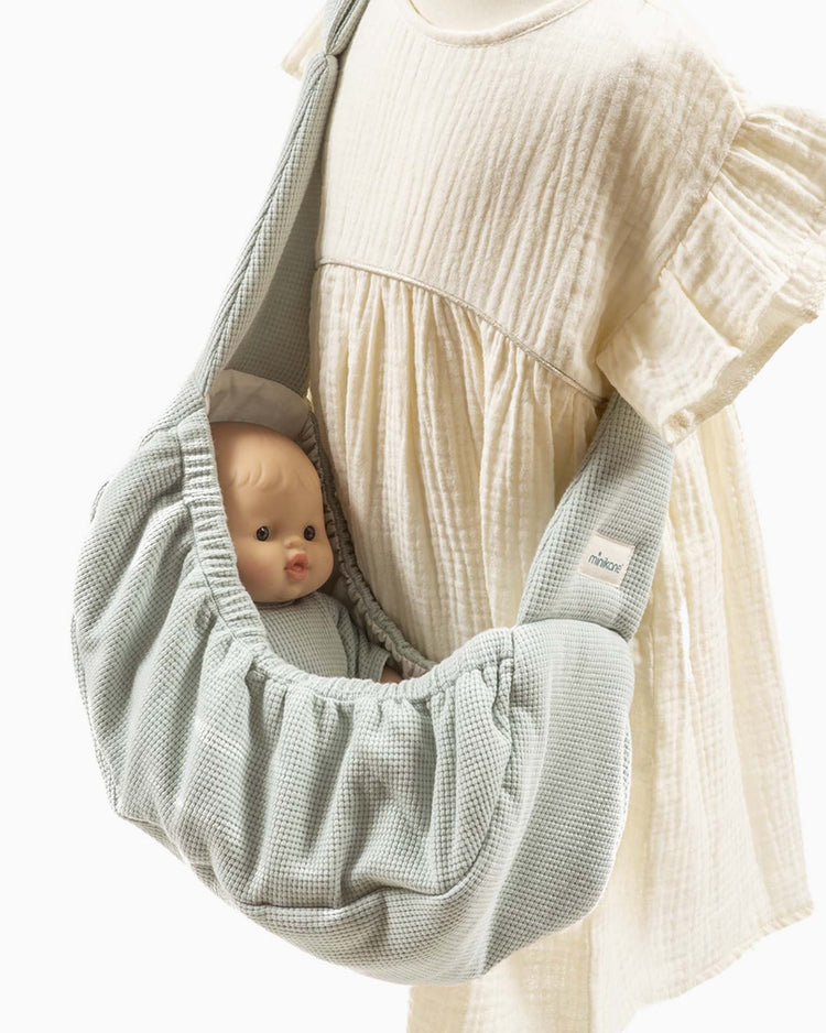 Little Minikane play waffle doll carrier in verdigris