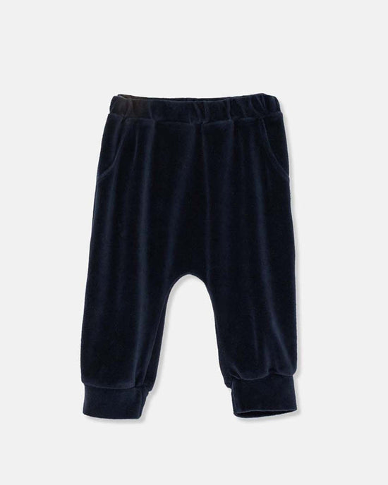 The cozmo chris velour baby pants in navy feature an elastic waistband, side pockets, and cuffed ankles in a soft fabric—ideal for little ones. Shown on a plain light background.