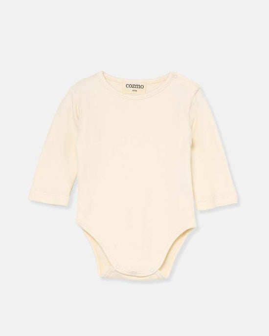 The cozmo sasha jersey newborn bodysuit in ivory features long sleeves and bottom snap buttons, made from soft, warm fabric and shown on a simple light background.