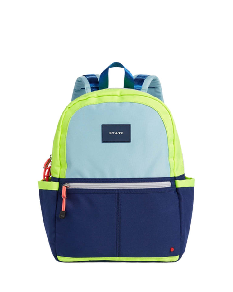 A kane kids backpack in navy/neon with a light blue, neon green, and navy blue design, featuring a front zip pocket, side pockets, and a small label on the front. Ideal for school trips, it comes with adjustable straps for added comfort by state bags.
