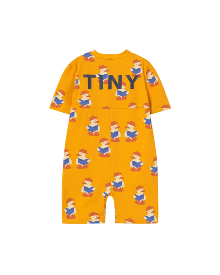 The deep yellow readers swim one-piece by tiny cottons features "TINY" on the back and unique reading bear prints, offering high-quality clothing for your little one.